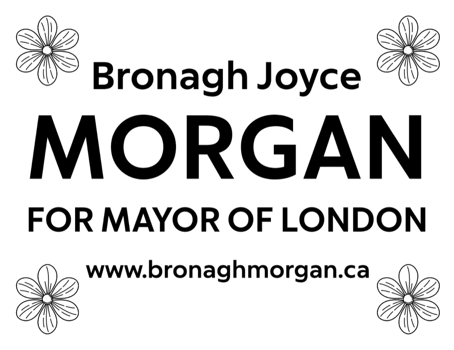 The lawn sign in black and white, with four large flower outlines in the corners.